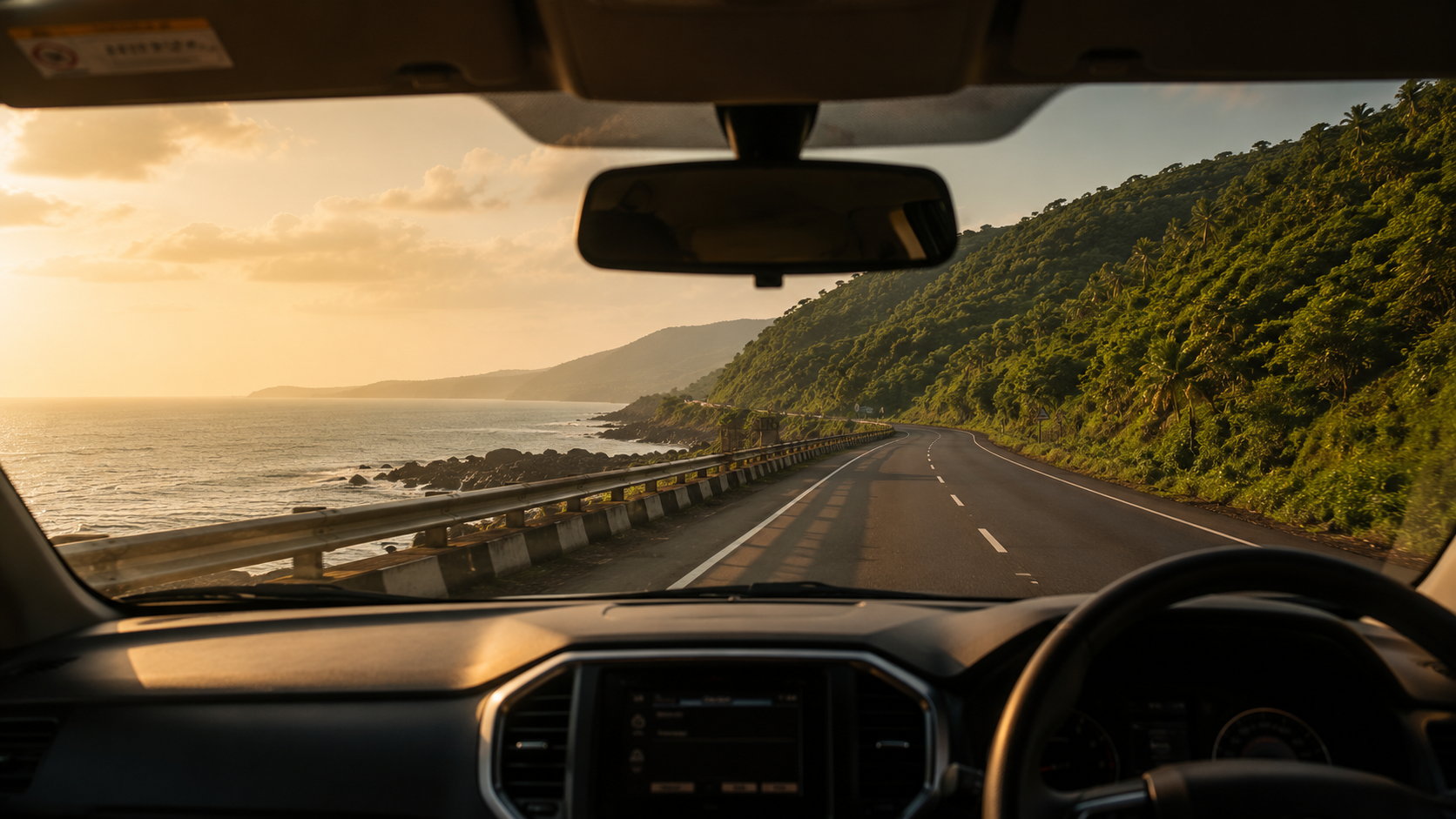  coastal highway with the sea visible on one side and green hills on the other, golden afternoon light, moody atmospheric travel photography