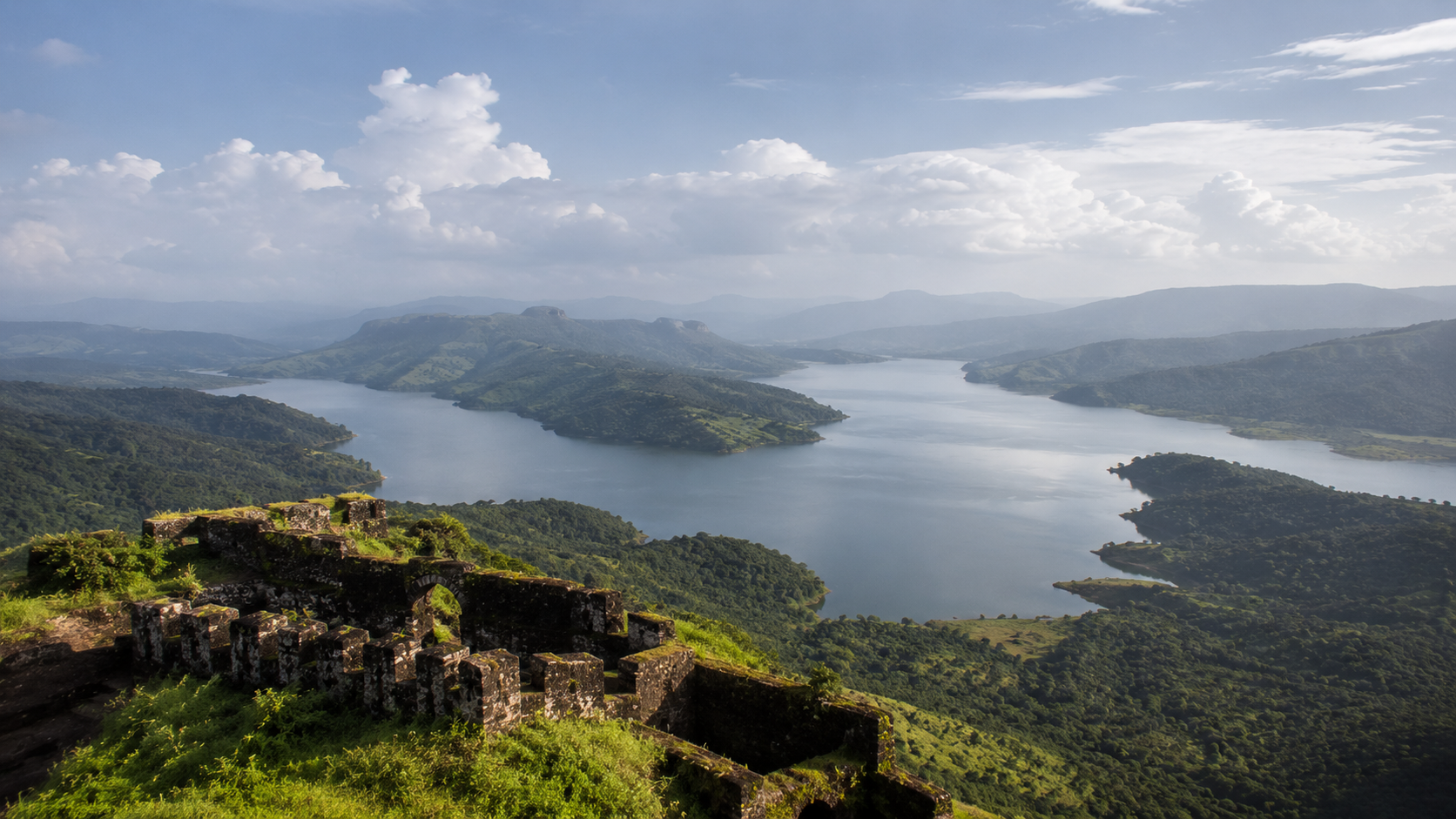Panoramic view of Pawna Lake and the surrounding valley seen from Tikona Fort